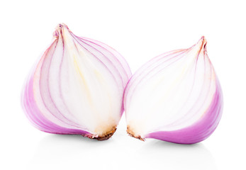 Slices of shallot onions for cooking on white background.