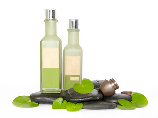 Cosmetic products arranged with zen stones