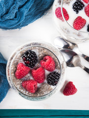 Chia pudding with fresh berries in glass for breakfast