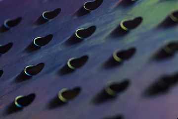 macro metal texture with hole. Grater. Abstract background