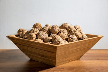 wooden bowl with wallnuts