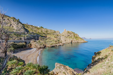 Fototapeta na wymiar Spiaggia nei pressi di Torre Normanna, provincia di Palermo IT