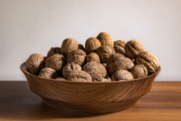 wooden bowl with wallnuts