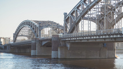 Old bridge over a wide river. Saint Petersburg, Neva river. November 2017
