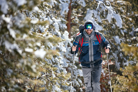 Extreme winter sports - Man hiking in the mountains