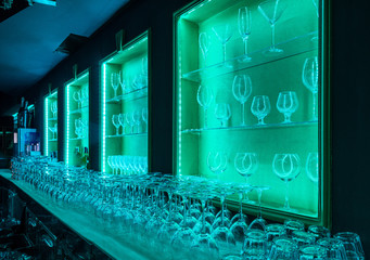 Crystal clear glasses stacked in bar