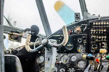 Vintage airplane cockpit interior. Cockpit of an old biplane