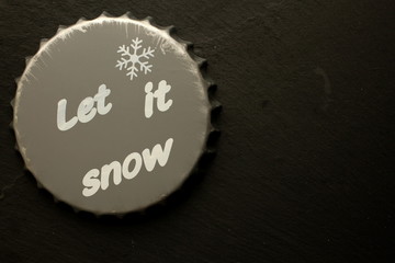 Decorative beer coaster with inscription on black background with space for your message