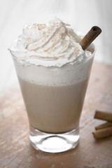 Frappuccino with whipped cream in a glass