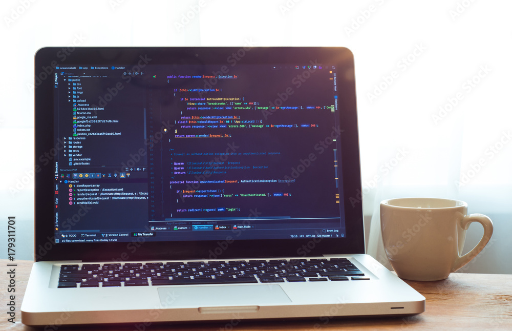Wall mural php code on laptop (web developing) and white mug