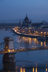 Parliament Building and part of bridge in Budapest and car trails in morining twilight 