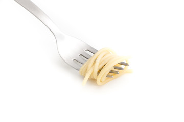 Plain cooked spaghetti pasta on fork, on white background.