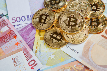 Fototapeta na wymiar bitcoin coins with euros