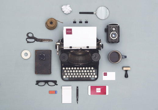 Vintage Typewriter with Smartphone, Stationery and Accessories Mockup