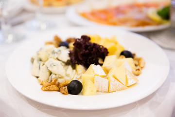Cheese plate on the table in restaurant