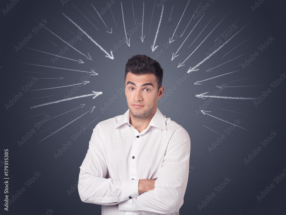 Wall mural Businessman with arrows