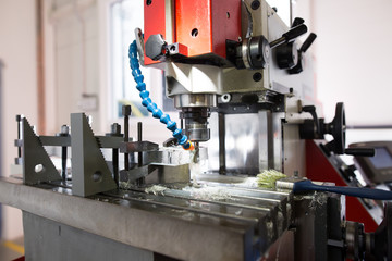 Metalworking CNC milling machine. Cutting metal modern processing technology.