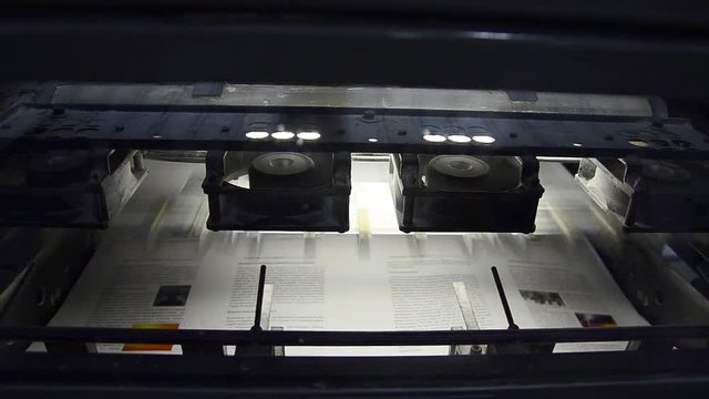 Offset Printing machine print dailiy magazine, closeup