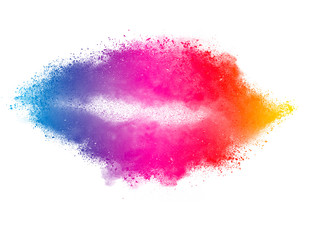 Splash of colorful powder over white background.