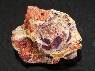 rough Bauxite (aluminium ore) stone on dark