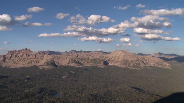 Time lapse of clouds moving over forest near Hayden Peak in the Uintas.