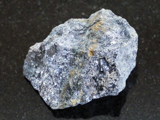 raw galena stone with chalcopyrite vein on dar
