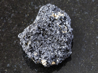 Perovskite stone on dark background
