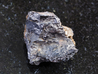 ilmenorutile (Nb-bearing rutile) stone on dark