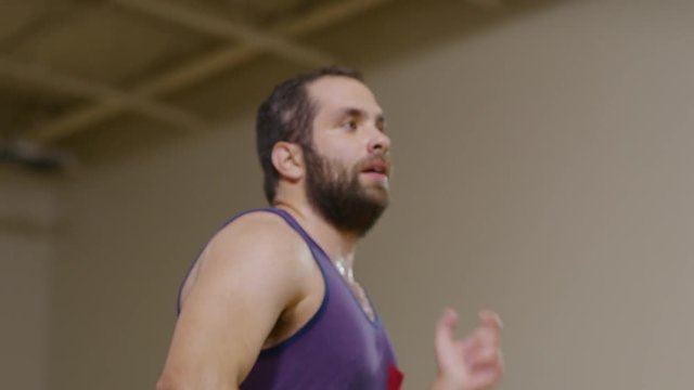 Close up panning shot of man dancing in exercise class / Orem, Utah, United States