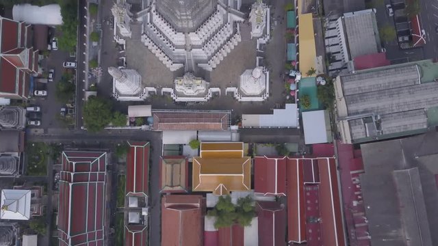 Aerial view of Wat Phra That Hariphunchai pagoda temple important religious traveling destination in Lamphun province northern of Thailand. icture high resolution on helicopter