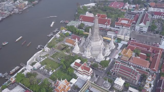 Aerial view of Wat Phra That Hariphunchai pagoda temple important religious traveling destination in Lamphun province northern of Thailand. icture high resolution on helicopter