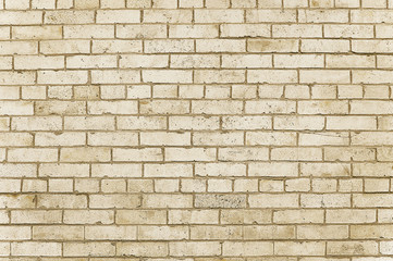 Old beige brick wall background texture