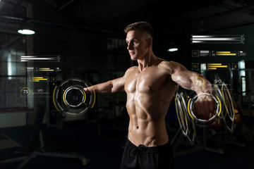 Fototapeta na wymiar close up of man with dumbbells exercising in gym
