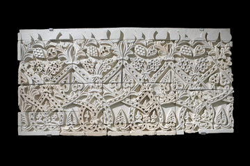 Ataurique baseboard. Detailed carved panel with intricate patterns, Cordoba, Andalusia, Spain