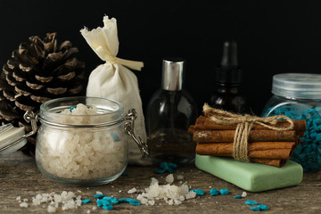 Bathroom accessories soap oils sea salt lavender aroma sachet on wooden desk toned selective focus