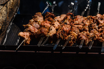 Shish kebab preparing on skewers