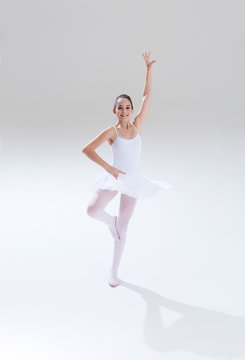 Female teenager in dancing pose