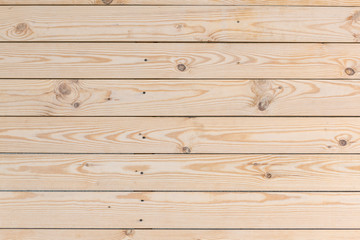 Fototapeta premium wooden wall of new boards, nailed down horizontally