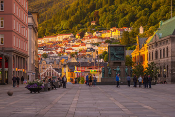 Fototapeta premium Scenic white night View Famous Bryggen street is a series of Hanseatic commercial buildings lining the eastern side of the harbour in Bergen, Norway.