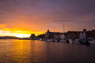 Scenic white night View Famous Bryggen street is a series of Hanseatic commercial buildings lining the eastern side of the harbour in Bergen, Norway.