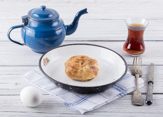 turkish borek boyoz with egg and tea