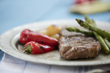 steak on blue background
