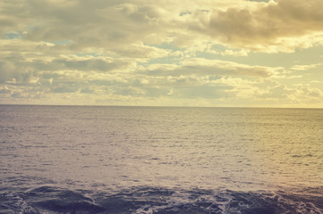 Defocused blurry beautiful sea coastline sun rays light outdoors natural background. Recreational tourism inspirational scenery photograph