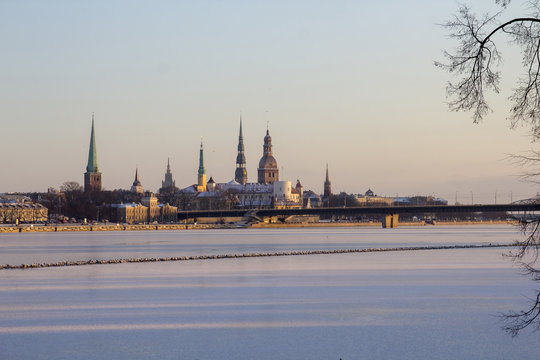 View of Old Riga with church towers on cold, snowy winter day
