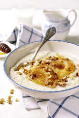 Oat porridge with caramelized pear and nuts.