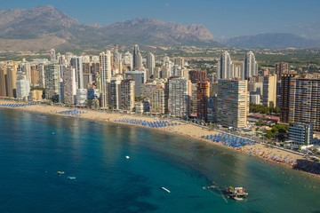 Fototapeta premium Coastline of a Benidorm. Aerial view of Benidorm, with beach and skyscrapers. Spain. Costa Blanca,