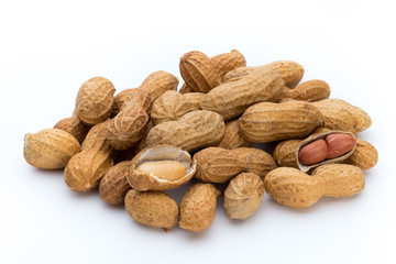 Dried peanuts on the white background.