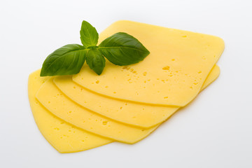 Cheese slices on the white background.