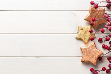 Christmas decor on the wooden white background.