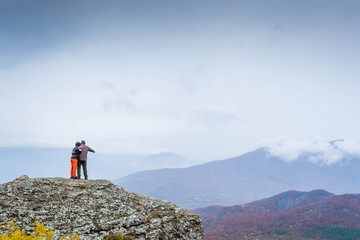 People on top of a cliff 4